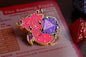 DND Devil Enamel Pin - The Smiling Fiend hard enamel pin with D20 and stat block backing card