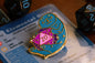 Fantasy Otter Enamel Pin - purple and gold hard enamel pin with butterfly clutch back